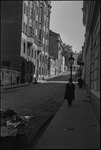 Street scene with a fruit stand and pedestrians in Moscow, Russia, USSR, ca. 1932-1933 by Jacobi, Lotte, 1896-1990