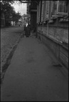 Woman walking along a street in Moscow, Russia, USSR, ca. 1932-1933 by Jacobi, Lotte, 1896-1990