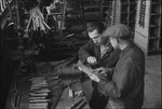 Two men working in a factory in Moscow, Russia, USSR, ca. 1932-1933 by Jacobi, Lotte, 1896-1990