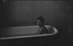 Smiling woman in a bathtub in Russia, USSR, ca. 1932-1933 by Jacobi, Lotte, 1896-1990