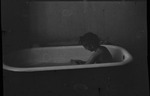 Woman in a bathtub in Russia, USSR, ca. 1932-1933 by Jacobi, Lotte, 1896-1990