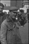 Man tipping his hat to the camera in the USSR, ca. 1932-1933 by Jacobi, Lotte, 1896-1990