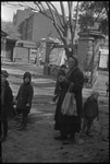 Woman and children on the street in the USSR, ca. 1932-1933 by Jacobi, Lotte, 1896-1990