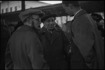 Group of men at a railroad station, with Karl Berngardovich Radek, a writer and Marxist revolutionary in the USSR, ca. 1932-1933 by Jacobi, Lotte, 1896-1990