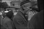 Man eating on a street in the USSR, ca. 1932-1933 by Jacobi, Lotte, 1896-1990