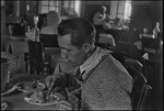 Man eating in a restaurant in Russia, USSR, ca. 1932-1933 by Jacobi, Lotte, 1896-1990