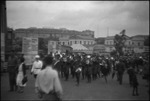 Marching band in the street during a parade in the USSR, ca. 1932-1933 by Jacobi, Lotte, 1896-1990