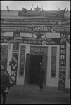 Man by a storefront in USSR, ca. 1932-1933 by Jacobi, Lotte, 1896-1990