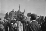 Gathering of people around a military truck with a military poster on the side in USSR, ca. 1932-1933 by Jacobi, Lotte, 1896-1990