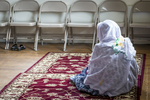 Praying during a Muslim Service, 2012 by Becky Field
