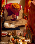 Bhutanese Man Honoring the Goddess Lakshmi, 2012 by Becky Field