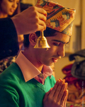 Young Bhutanese Man Praying During Diwali, 2012 by Becky Field