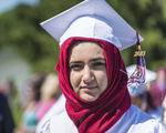 High School Graduate with Red Hijab, 2013 by Becky Field