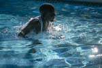 Young Congolese Man Swimming, 2016 by Becky Field
