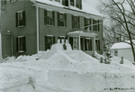 Winter Carnival, February 2, 1935: Phi Kappa Alpha House and snow sculpture by Clement Moran