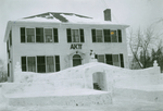 Winter Carnival, February 2, 1935: Alpha Kappa Pi House and snow sculpture by Clement Moran