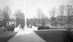 Flagpole and sidewalk in front of Thompson Hall, October 28, 1924 by Pond, Bremer Whidden, 1884-1959