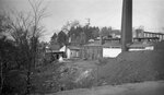 Heating plant and shop buildings seen from old railroad bed, October 28, 1924 by Pond, Bremer Whidden, 1884-1959