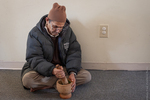 Bhutanese Man with Mortar and Pestle, 2012 by Becky Field