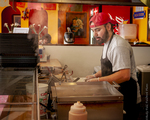 Guatemalan Man Working in Restaurant, 2012 by Becky Field