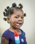 Cameroonian Girl with Ice Pop, 2018 by Becky Field