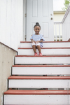Haitian Girl on the Steps, 2018 by Becky Field