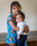 Bhutanese Girl with Baby Brother, 2012 by Becky Field