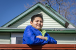 Salvadorian Boy on His Porch, 2016 by Becky Field